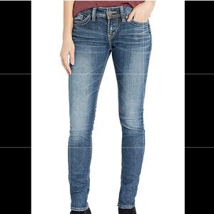 Silver mid rise skinny jeans